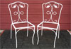 Patio Chairs. A pair of steel chairs painted white and ready for seats.